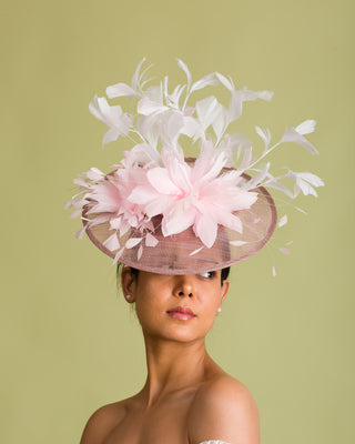 fascinator with pink pearl earings necklace